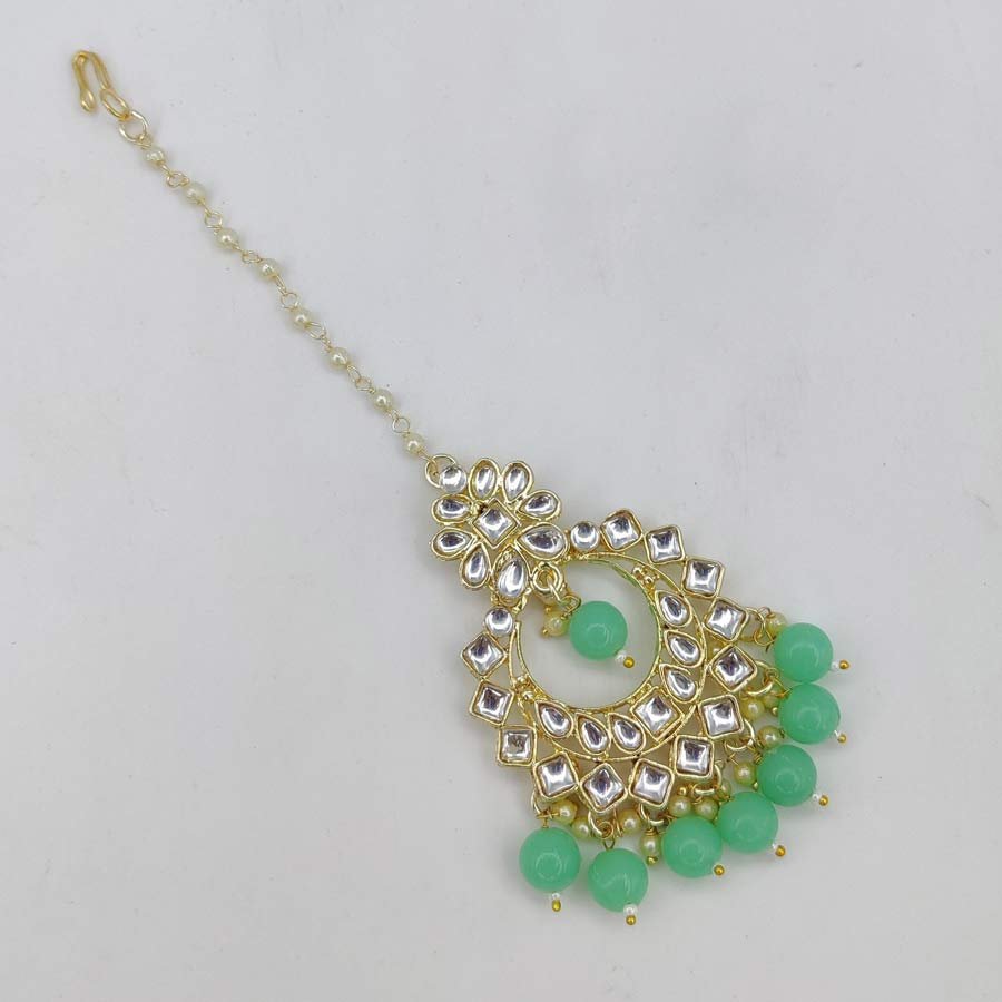 Gold plated unique design Studded with Light Green Kundan stones