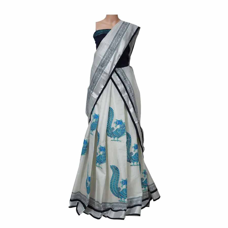 A grandiose peacock design ensemble to give a Midas touch to your ethnic wardrobe.