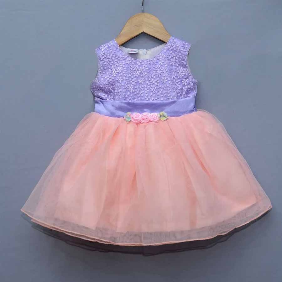 All delicate, pastel tones and pearl studded satin flowers for your little munchkin.
