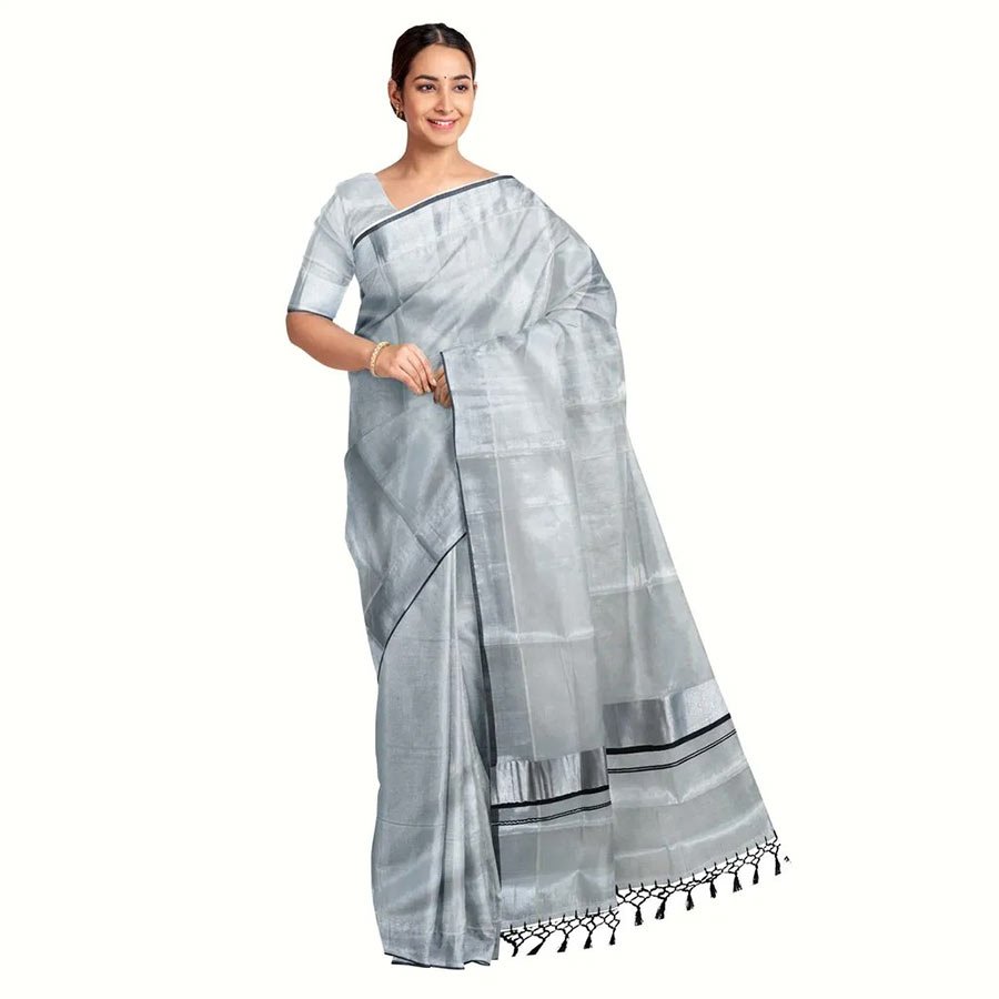 The versatility of kottar kasavu sarees is that it makes you feel in between classic and contemporary. While, the black border gives it a authentic, formal look, the silver kasavu nestled between them gives it a traditional touch. This 'velli kasavu' sarees are perfect for both, a formal official meeting and a festive gathering.