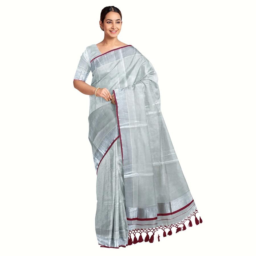 The versatility of kottar kasavu sarees is that it makes you feel in between classic and contemporary. While the red border gives it a authentic formal look, the silver zari nestled between them gives it a traditional touch. This 'Velli kasavu' sarees are perfect for both, a formal official meeting and a festive gathering.