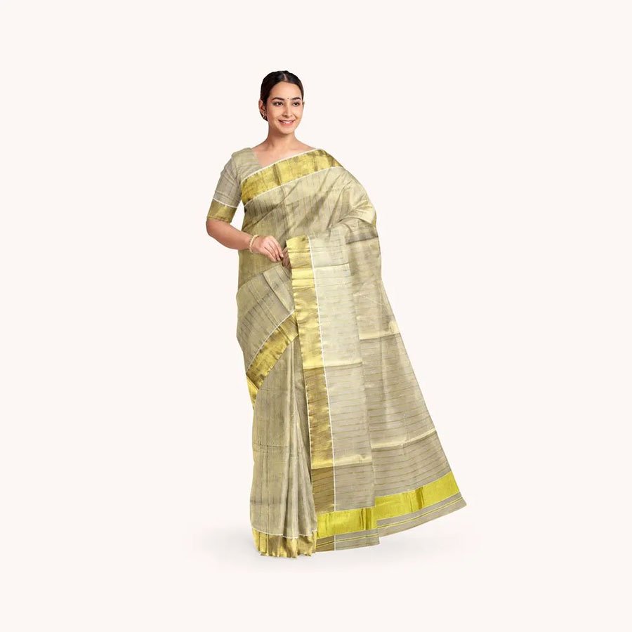 A distinctive saree design with luxurious threads intricately woven into an opulent fabric with sheen. Celebrate the ageless charm of indian textiles and the power of auspicious hues with this Kasavu collection.