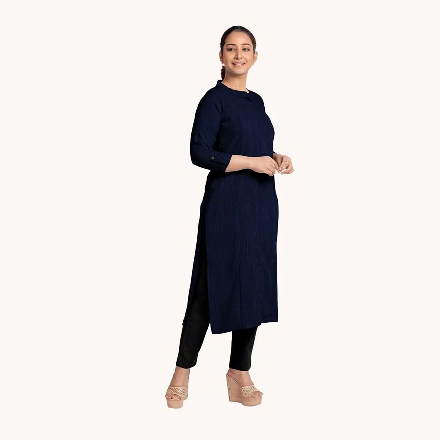 Tailored with fine and breathable hand woven fabric, this long kurti with princess cut and roll up sleeves is a wardrobe staple for every women.