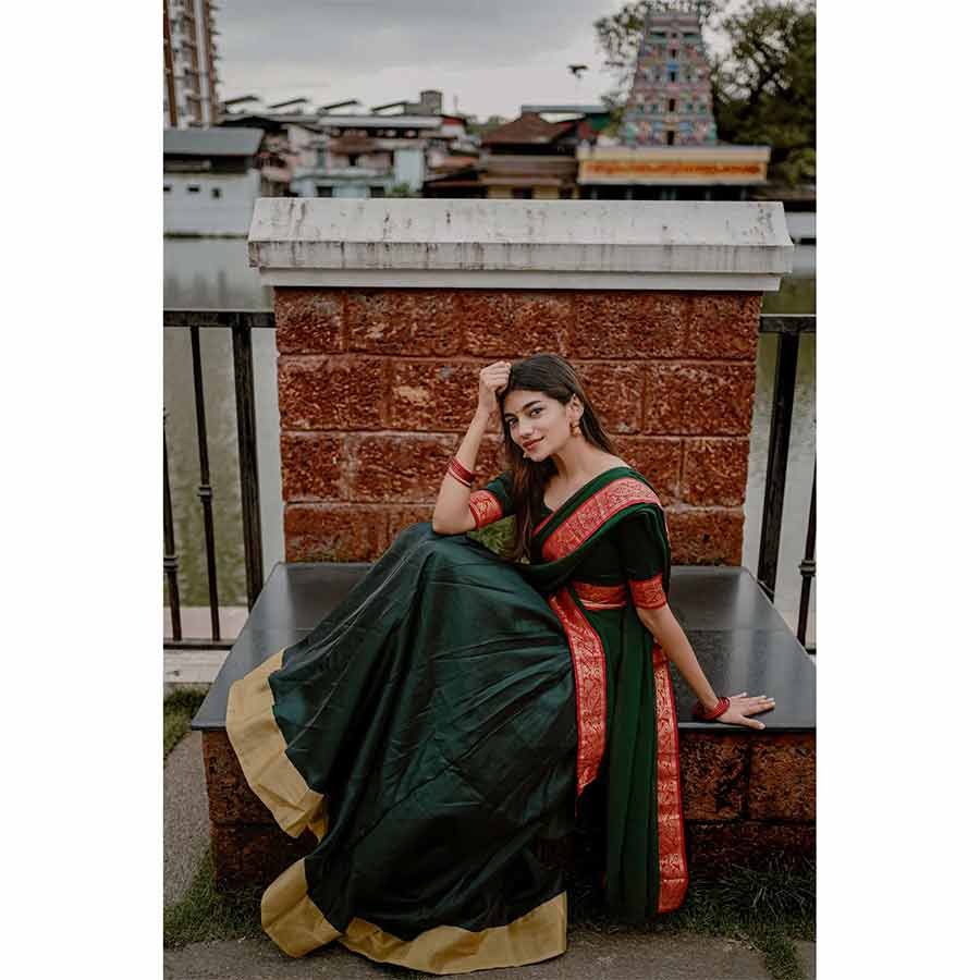 Traditional silhouettes that reflect our cultural heritage.... Inspired by the hues of the nature, this divine green ensemble is dramatised with red brocade trimmings along the borders. A perfect ensemble for millennial bridesmaids .