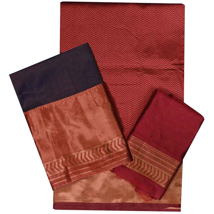 An ode to south Indian classic drapes. An exquisite half saree in a festive combination of hues. Embrace this festival season with this one of a kind traditional drape with intricately woven zari border.